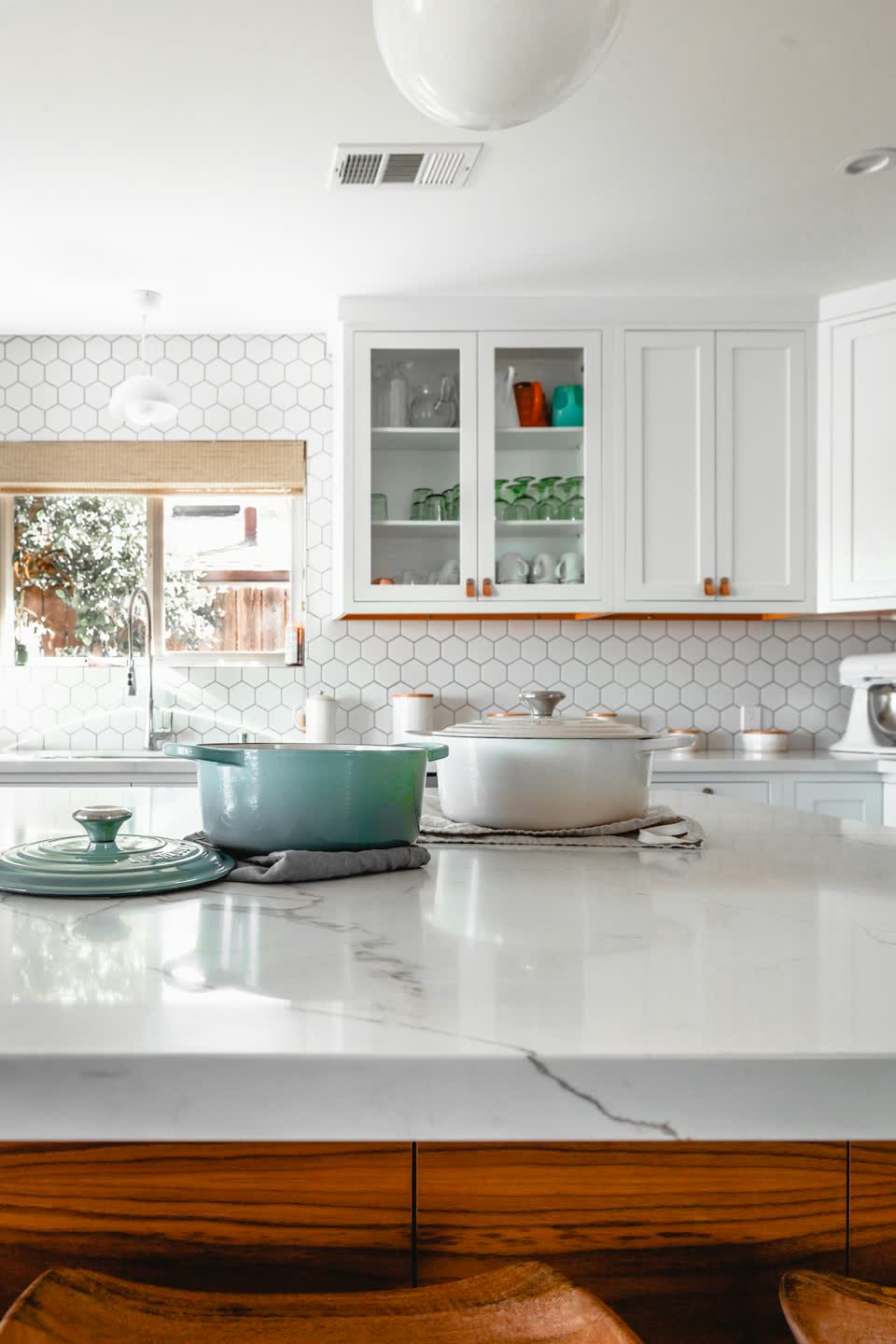 Remodeled kitchen with wood cabinets, used in the Arroyo and Pine design concept.