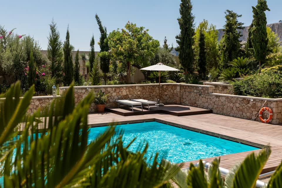 Outdoor pool with clear water, used in the Mesa Cedar Pools design concept.